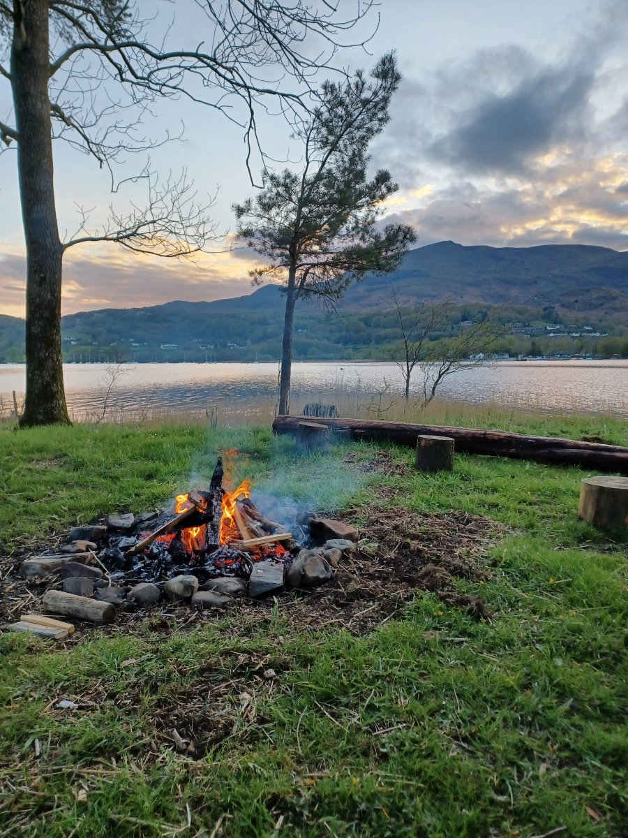 Camp fire and BBQ area on Low Bank Ground waterfront